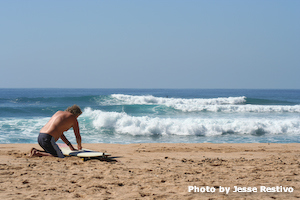 MacLaren, waxing it up, gonna go surf Makaha.